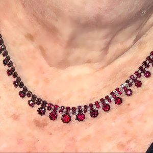 Red stone necklace with black metal framing